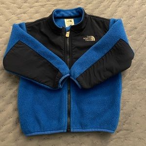 Blue The North Face jacket.